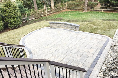 Inspiration for an arts and crafts backyard garden in DC Metro with concrete pavers.