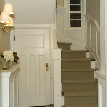 small door under staircase