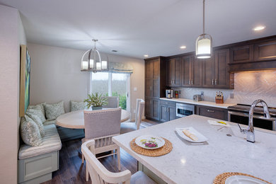 Example of a large transitional vinyl floor kitchen design in Sacramento with an island