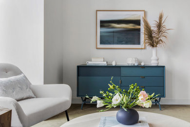 Inspiration for a mid-sized contemporary freestanding desk gray floor home office remodel in San Francisco with white walls