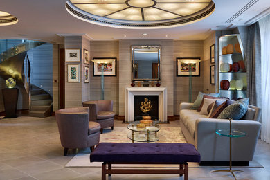 Large traditional formal open plan living room in London with grey walls, concrete flooring, a wooden fireplace surround, no tv and grey floors.