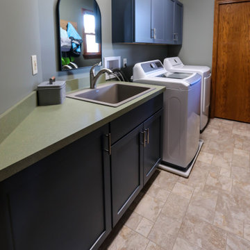 Updated Laundry Room with Stormy Medium-Blue Cabinets