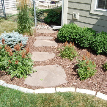 Minneapolis Full Landscape Renovation: Patios, Walkways, Plantings and Lawn