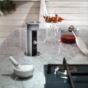 Contemporary off white kitchen with carrara marble countertop
