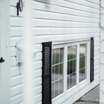 Full  Exterior Renovation White Vinyl Siding