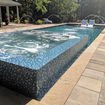 Gorgeous Glass Tile 360 Spillover Spa and lap pool