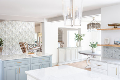 Inspiration for a mid-sized coastal light wood floor, brown floor, wallpaper ceiling and wallpaper dining room remodel in Orlando with white walls