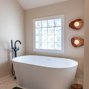 Primary & Guest Bathroom Remodel with Improved Layout and Heated Terrazzo Floors