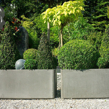 Modern Landscape and Patio Design with Large Modern Garden Planters