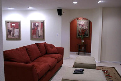 Example of a classic family room design in Denver