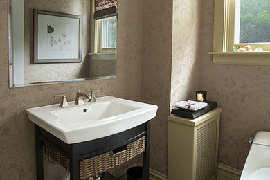 Bathroom - small modern 3/4 blue tile and mosaic tile mosaic tile floor and blue floor bathroom idea in Los Angeles with a console sink, furniture-like cabinets, dark wood cabinets, a one-piece toilet, beige walls and solid surface countertops