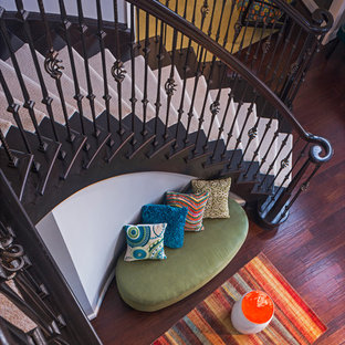 Inspiration for a large eclectic foyer in Detroit with grey walls, dark hardwood floors, a double front door, a brown front door and brown floor.