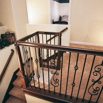 Wrought Iron Wood Railing at New Loft
