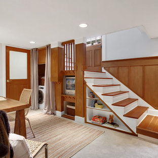 Classic basement in Seattle with grey walls, carpet, grey floors and no fireplace.