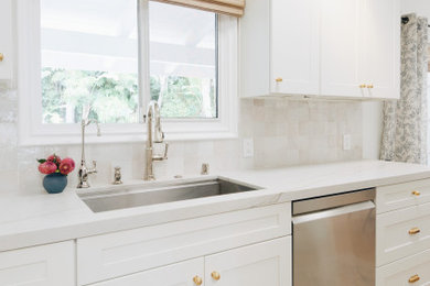 Example of a transitional kitchen design in Orange County
