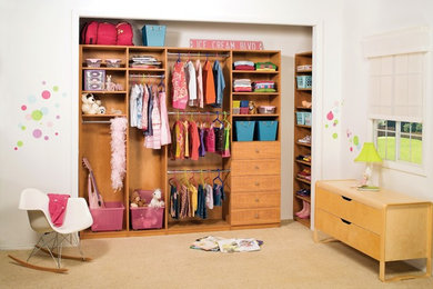 Inspiration for a mid-sized transitional kids' bedroom for kids 4-10 years old and girls in Dallas with beige walls and carpet.