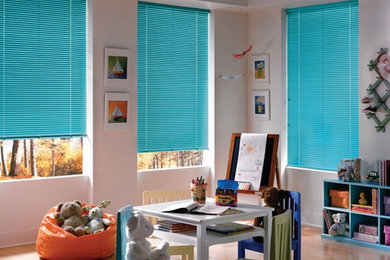 Inspiration for a timeless kids' room remodel in Other with white walls