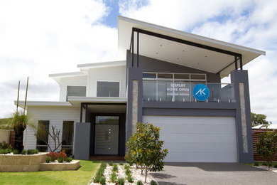 Inspiration for a large modern home design in Perth.
