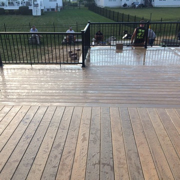 Timbertech legacy deck with aluminum rails with lighted post caps.