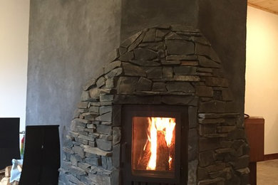 Mountain style family room photo in Other
