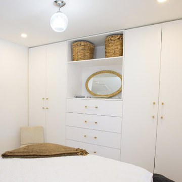 Full Bedroom Storage Wall with White Wardrobes | East York