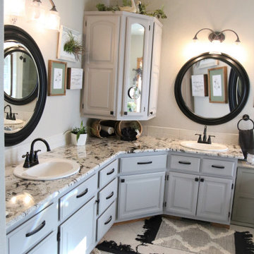 Alaska White Granite Countertops On Painted White Vanity Cabinets