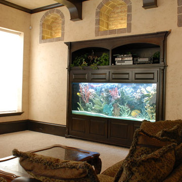 Saltwater Aquarium with Custom Coral Reef Insert in Family Room