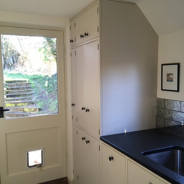 Utility Room - boiler housing, airing cupboard, ironing board cupboard