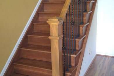 Mid-sized traditional wood l-shaped staircase in Denver with wood risers and mixed railing.