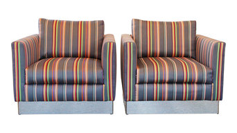 Club chairs reupholstered in Paul Smith fabric
