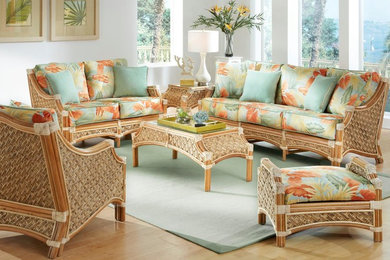 Mid-sized island style formal and enclosed light wood floor living room photo in New York with white walls