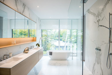 Minimalist master gray tile and white tile multicolored floor bathroom photo in Other with flat-panel cabinets, dark wood cabinets, multicolored walls and an integrated sink