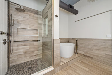 Huge trendy master gray tile and marble tile marble floor, gray floor, double-sink, exposed beam and shiplap wall bathroom photo in Chicago with furniture-like cabinets, gray cabinets, a wall-mount toilet, white walls, an undermount sink, quartz countertops, a hinged shower door, white countertops, a niche and a floating vanity