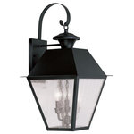 Livex Lighting - Mansfield Outdoor Wall Lantern, Black - With stunning seeded glass and a black finish, this outdoor wall lantern will make an elegant addition to any outdoor space. Formed from solid brass & traditionally-inspired, this downward hanging outdoor wall lantern is perfect for a driveway, back porch or entry way.