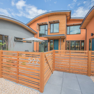 Custom solar shade eyebrows over exterior windows
