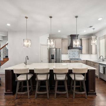 Open Concept Kitchen with Oversized Marble Island after remodel