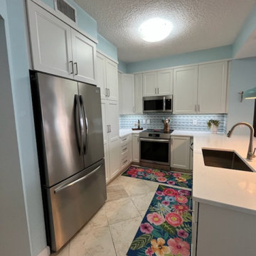 Contemporary Kitchen Remodel Done in a White Portland Door