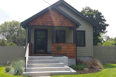 Inspiration for a small craftsman beige one-story mixed siding exterior home remodel in New York with a shingle roof