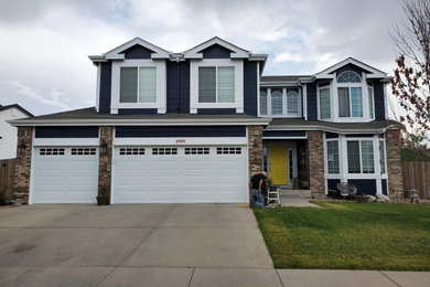 Example of a transitional two-story exterior home design in Denver