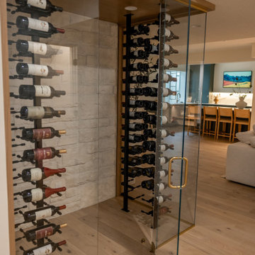 Luxury Basement Remodel with Custom Bar, Wine Display & Wellness Retreat