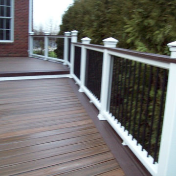 TREX TRANSCENDS SPICED RUM WITH VINTAGE LANTERN BORDER & WHITE TREX RAILING