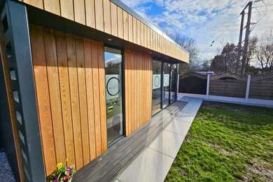 Photo of a medium sized contemporary detached office/studio/workshop in Cheshire.
