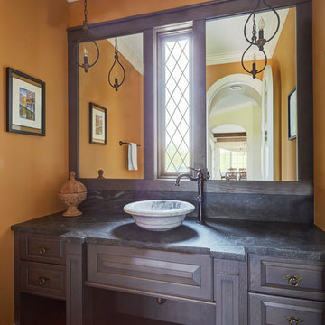 Custom Cabinetry in Powder Room with Stone Vessel Sink