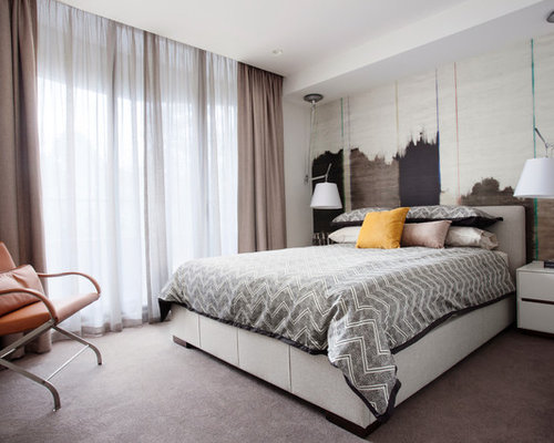 Concealed With Curtain Mid-sized contemporary bedroom idea in Melbourne with white walls and carpet