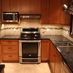 Warm and Inviting RIft Oak Spice - Kitchen Cabinetry