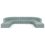 Meridian Furniture - Arc Vegan Leather Upholstered 10-Pc. U-Shaped Modular Sectional, Green - Unleash modern opulence with the Arc Vegan Leather 10pc. Sectional. Crafted for the modern connoisseur, this Sectional injects an air of refined luxury into any space. Its sleek silhouette, upholstered in supple mint green vegan leather, exudes timeless sophistication while the deep channel tufting adds textural intrigue, further elevating the chair's visual appeal. The modular design makes it a versatile chameleon, effortlessly adapting to your evolving needs and preferences. Whether you envision it gracing a chic living room corner, basking in the glow of a bedroom window, or adding a touch of drama to a home office, the Arc seamlessly complements your unique interior aesthetic.