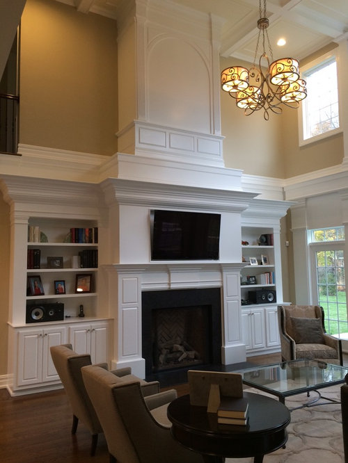 Two Story Fireplace and BuiltIn Bookshelves