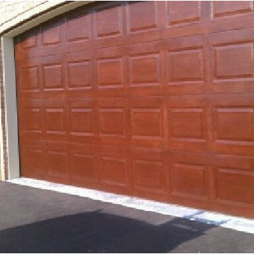 Exterior Painting: Faux wood finish on steel doors