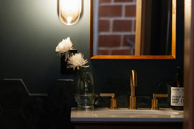 Mid-century modern powder room photo in Portland