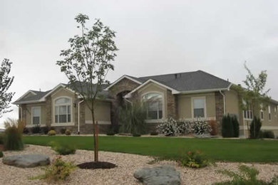 Inspiration for a beige exterior home remodel in Denver
